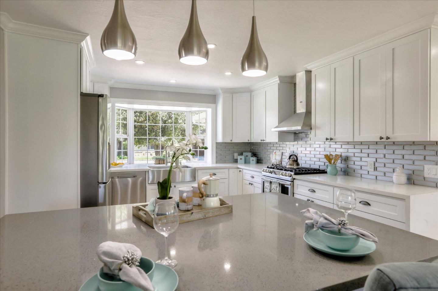 1241 Wasatch Drive Mountain View, CA 94040 - Photo 18 of 66 a kitchen with furniture a window and appliances