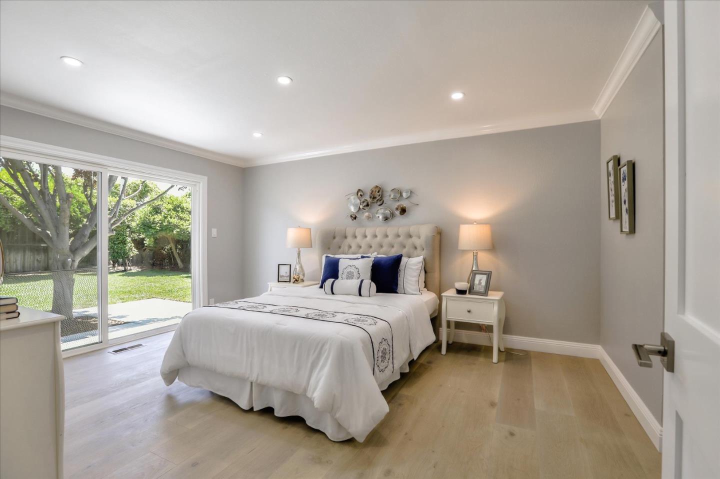 1241 Wasatch Drive Mountain View, CA 94040 - Photo 37 of 66 a spacious bedroom with a bed and a large window