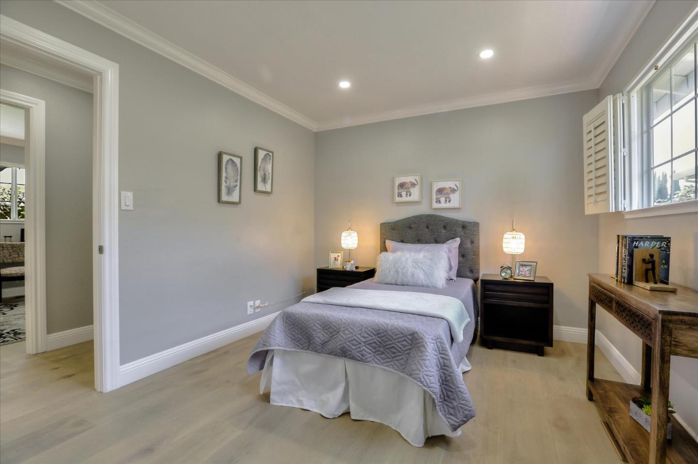 1241 Wasatch Drive Mountain View, CA 94040 - Photo 43 of 66 a bedroom with a bed and lamp