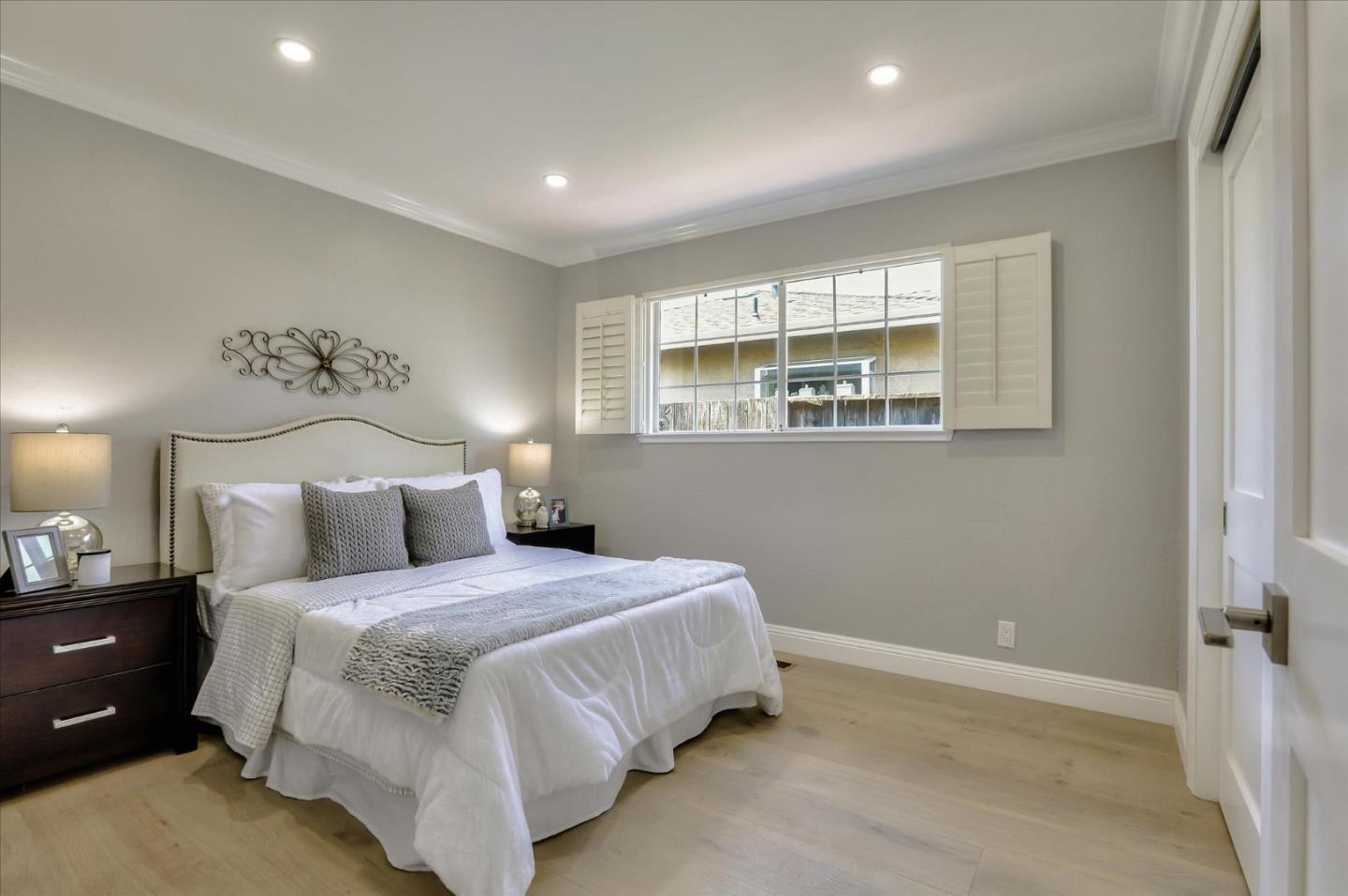 1241 Wasatch Drive Mountain View, CA 94040 - Photo 45 of 66 a bedroom with a large bed and a window