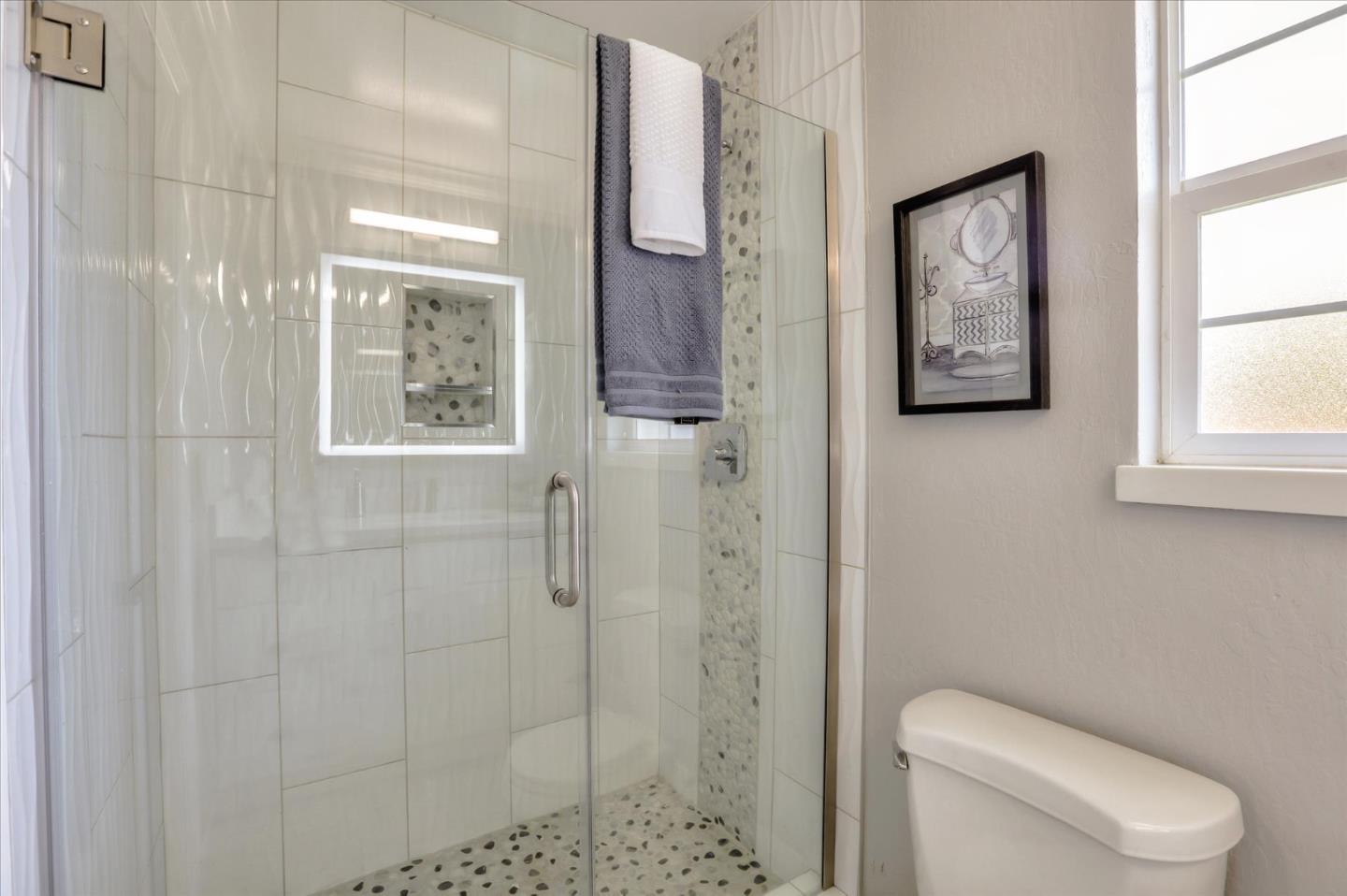 1241 Wasatch Drive Mountain View, CA 94040 - Photo 50 of 66 a white toilet sitting next to a bathroom sink