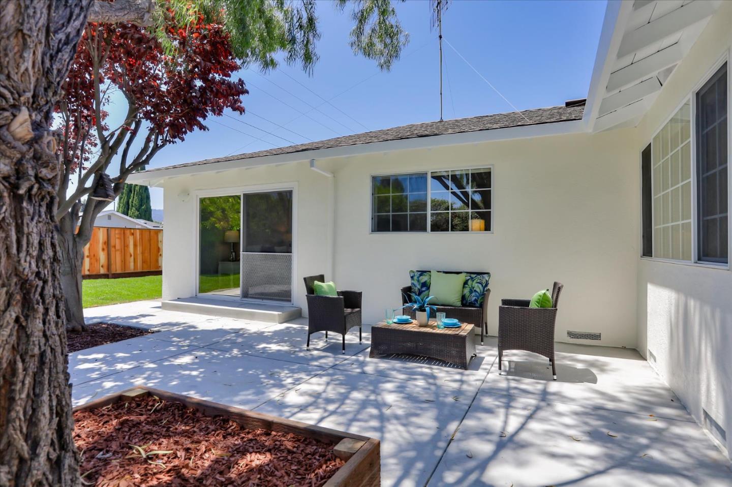1241 Wasatch Drive Mountain View, CA 94040 - Photo 55 of 66 a view of a patio with table and chairs and potted plants