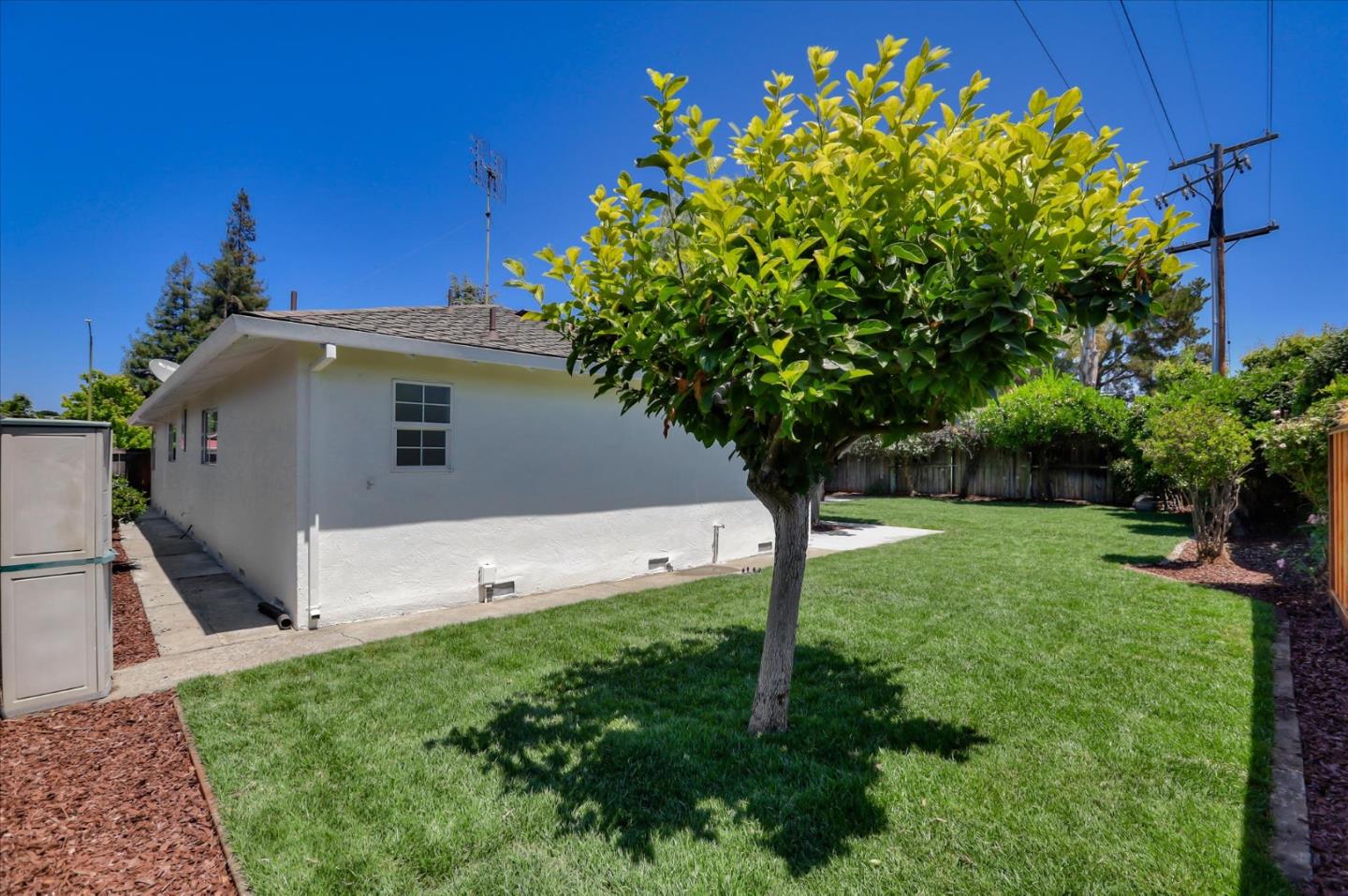 1241 Wasatch Drive Mountain View, CA 94040 - Photo 61 of 66 a view of a house with a yard