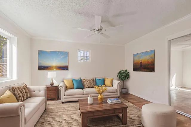 an empty room with windows and closet