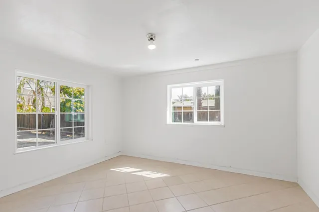 an empty room with windows