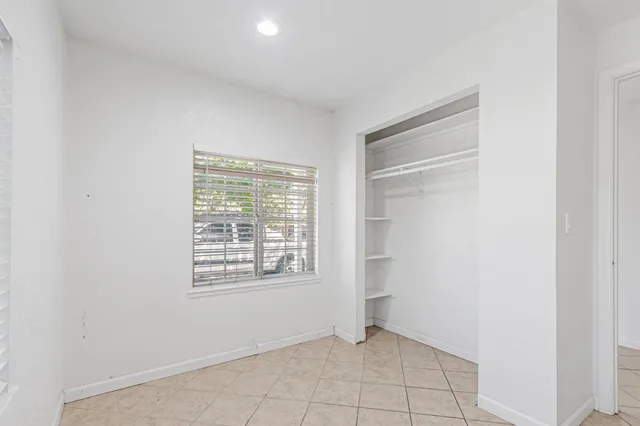 a view of a backyard with a patio