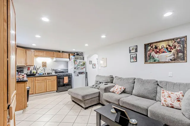 a bedroom with furniture and a fireplace
