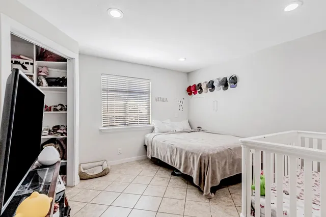 a view of house with backyard