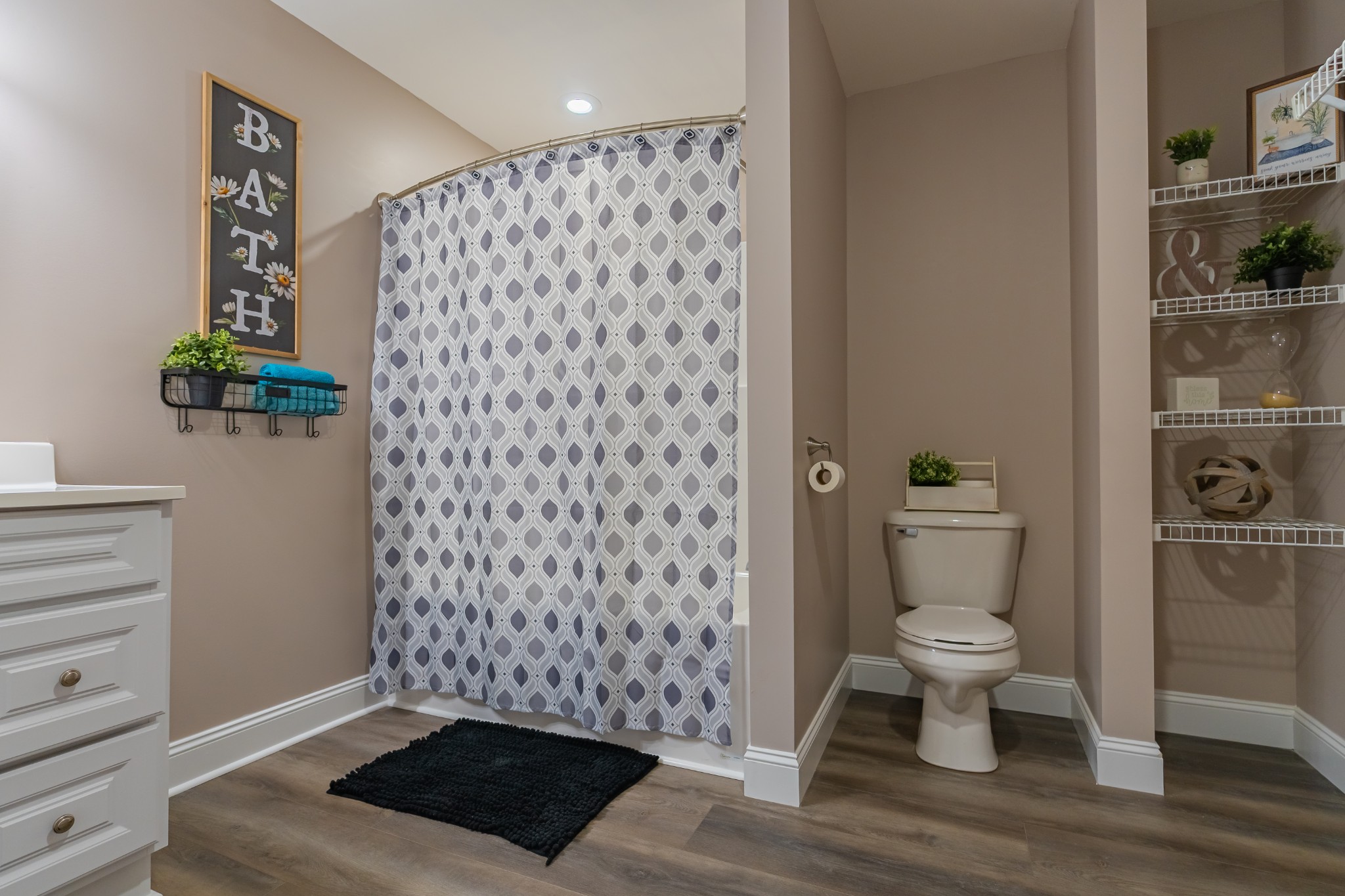 34 Bailey Road Decherd, TN 37324 - Photo 23 of 27 a view of bathroom with a toilet and a shower curtain