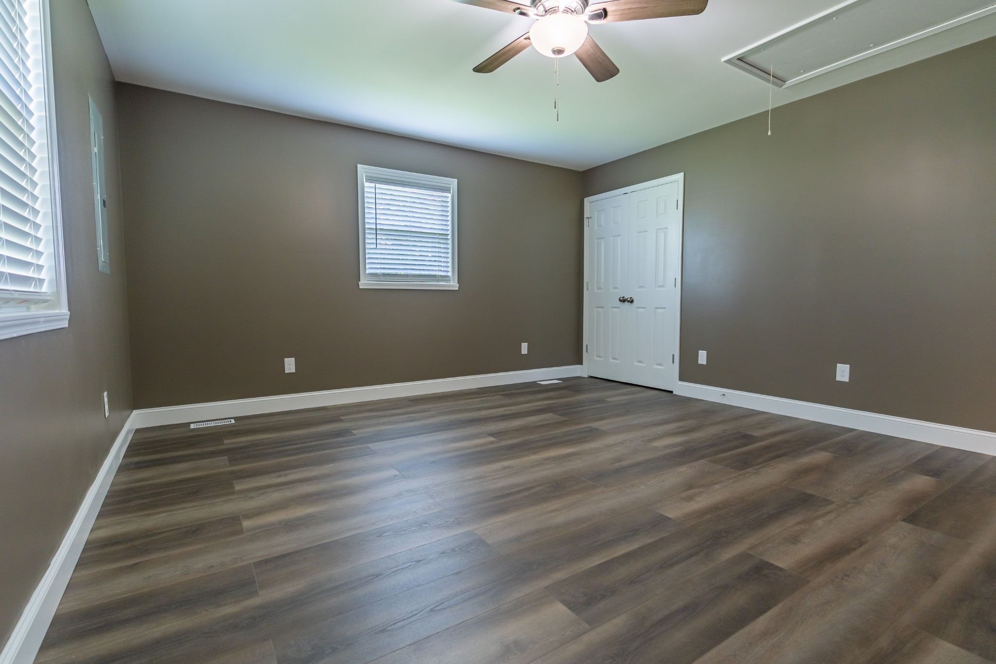 34 Bailey Road Decherd, TN 37324 - Photo 24 of 27 a view of a room with a ceiling fan and hardwood floor