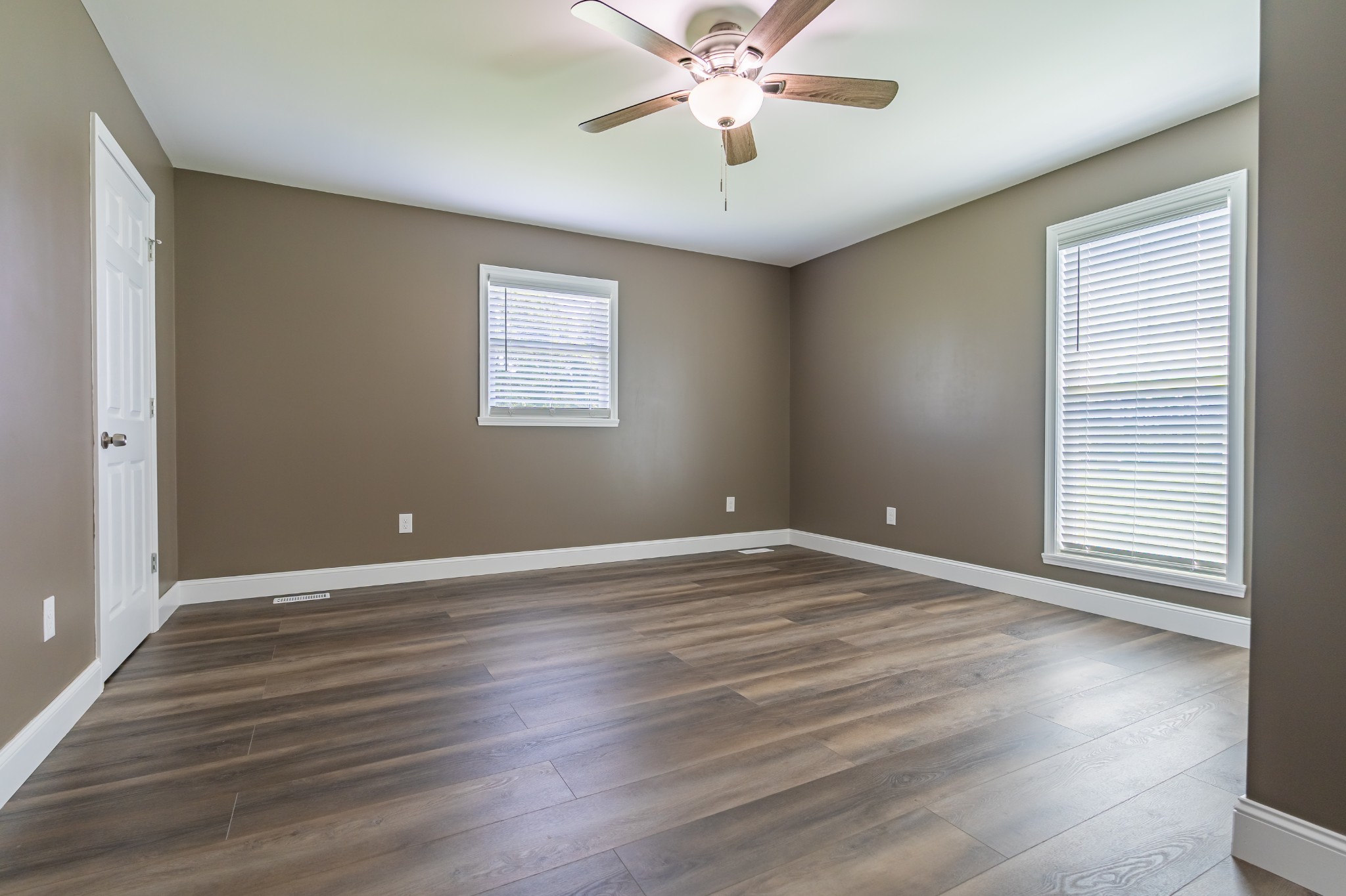 34 Bailey Road Decherd, TN 37324 - Photo 25 of 27 a view of an empty room with wooden floor and a window