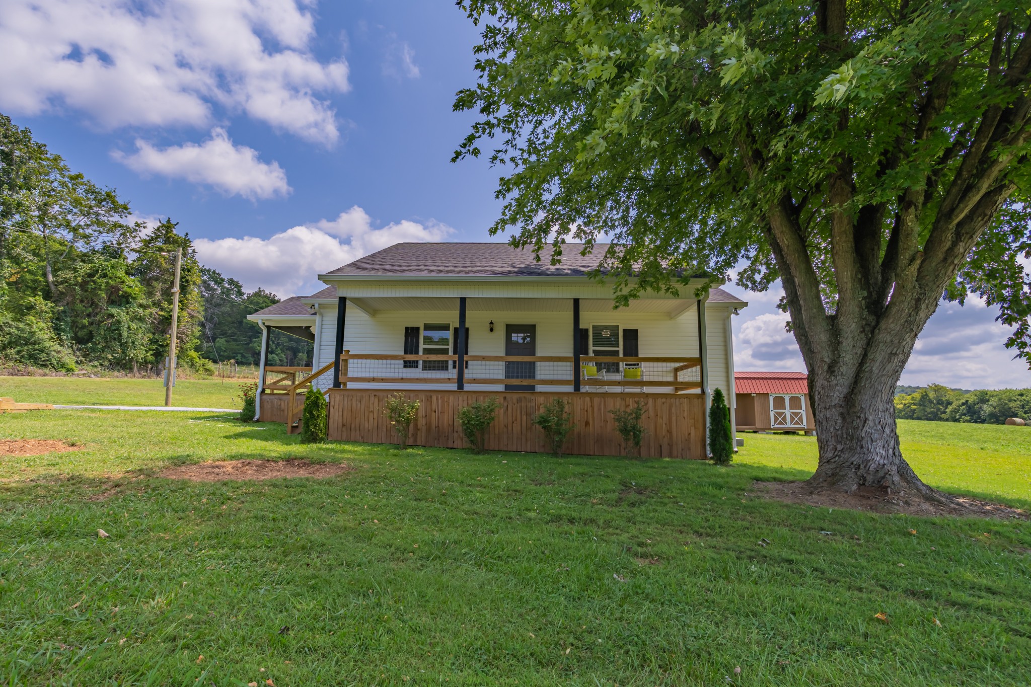 34 Bailey Road Decherd, TN 37324 - Photo 3 of 27 a view of house with a big yard