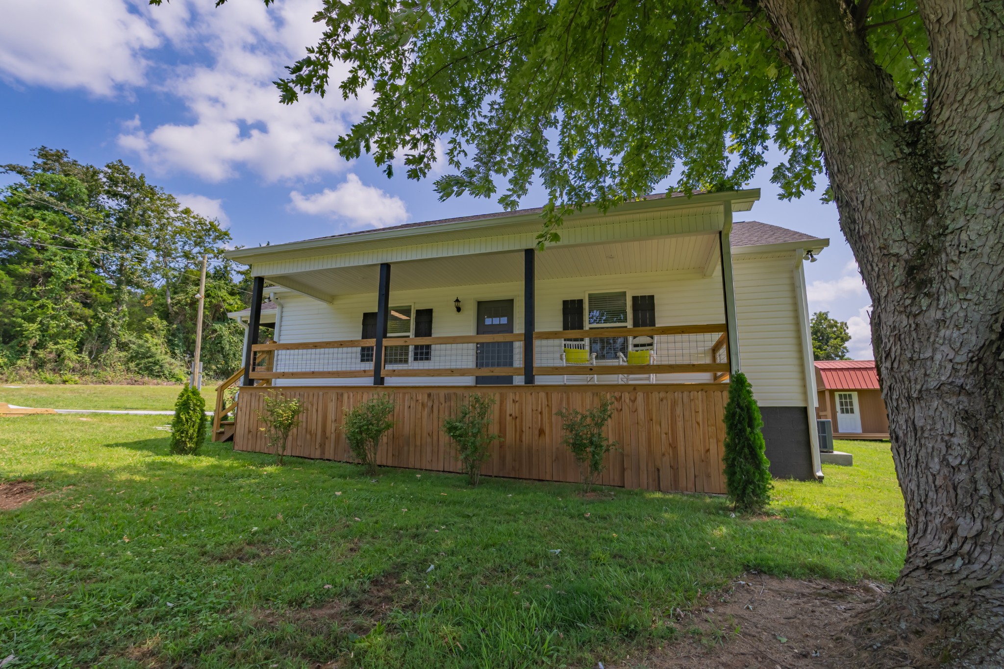 34 Bailey Road Decherd, TN 37324 - Photo 7 of 27 a view of house with a backyard