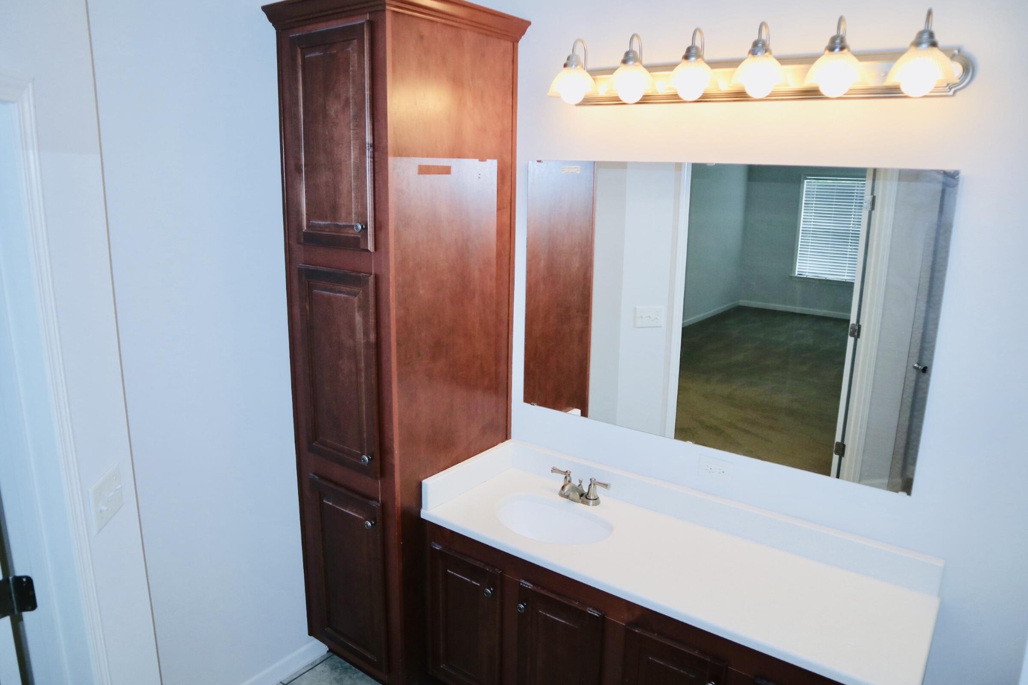 834 East Raccoon Valley Drive Heiskell, TN 37754 - Photo 13 of 20 a bathroom with a sink and a mirror