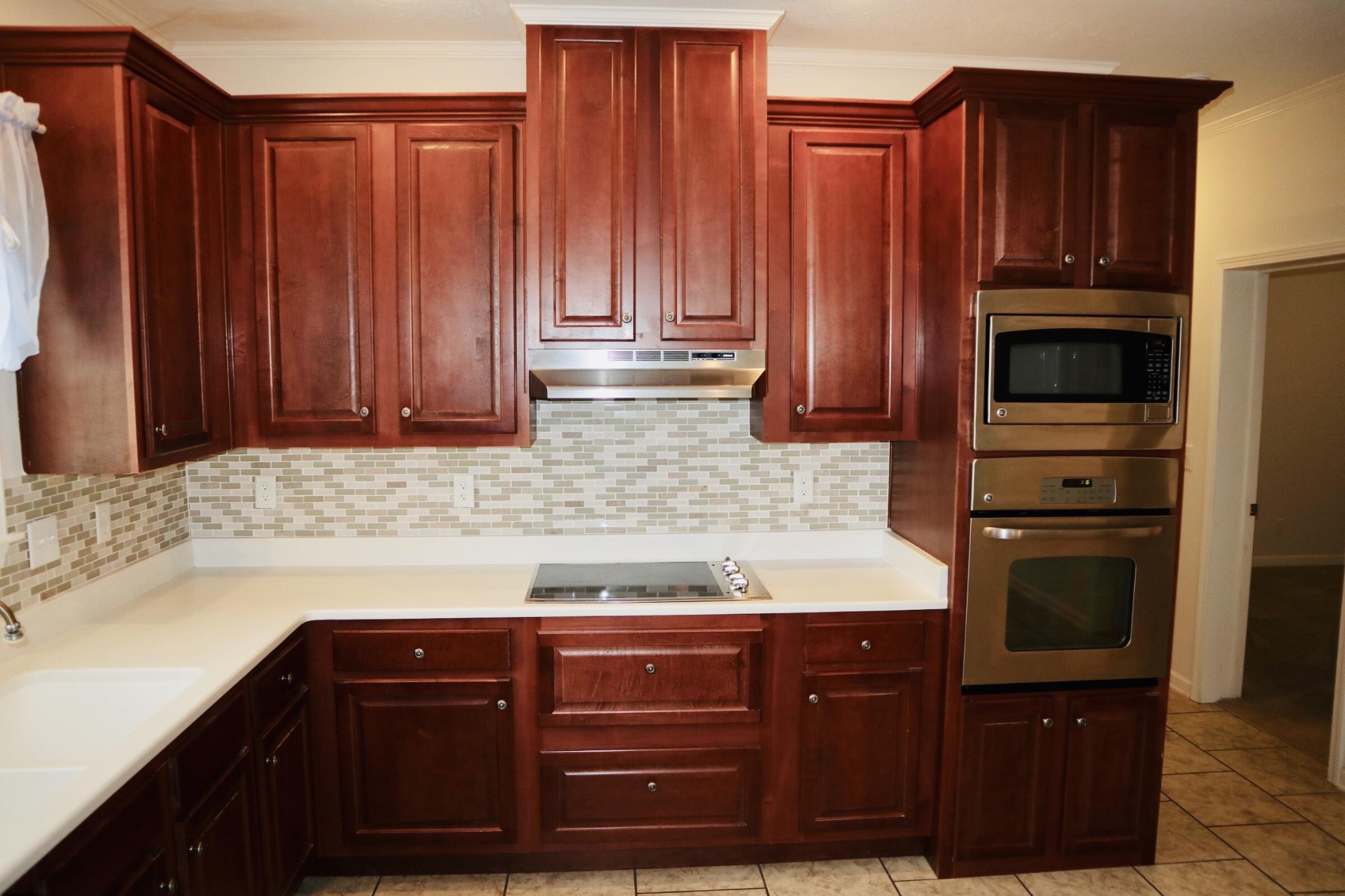 834 East Raccoon Valley Drive Heiskell, TN 37754 - Photo 5 of 20 a kitchen with granite countertop wooden cabinets and stainless steel appliances