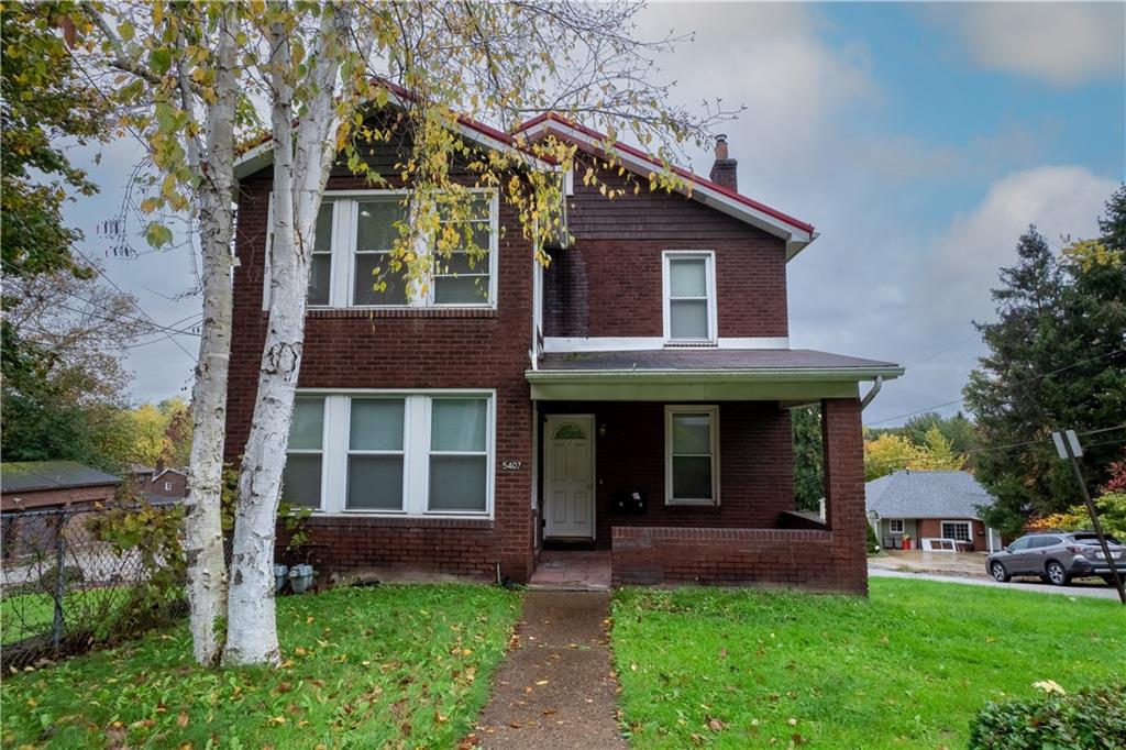 5407 Verona Road Verona, PA 15147 - Photo 1 of 25 front view of a house with a yard