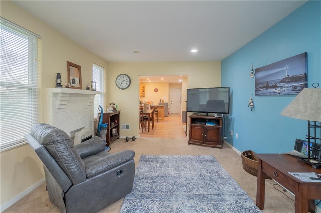 5407 Verona Road Verona, PA 15147 - Photo 4 of 25 a living room with furniture and a flat screen tv
