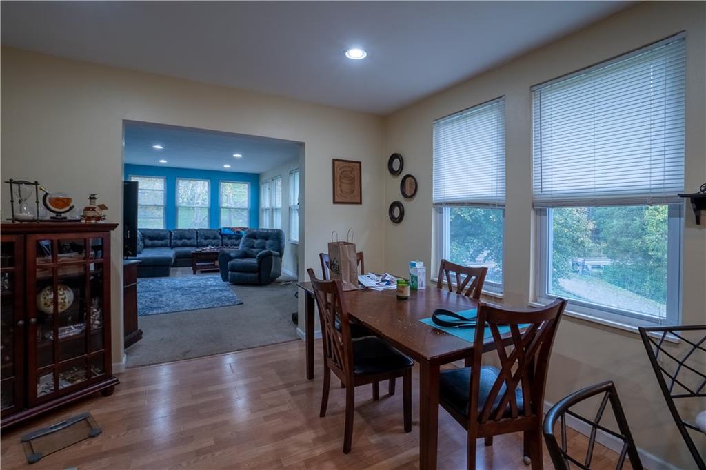 5407 Verona Road Verona, PA 15147 - Photo 5 of 25 a dining room with furniture and wooden floor
