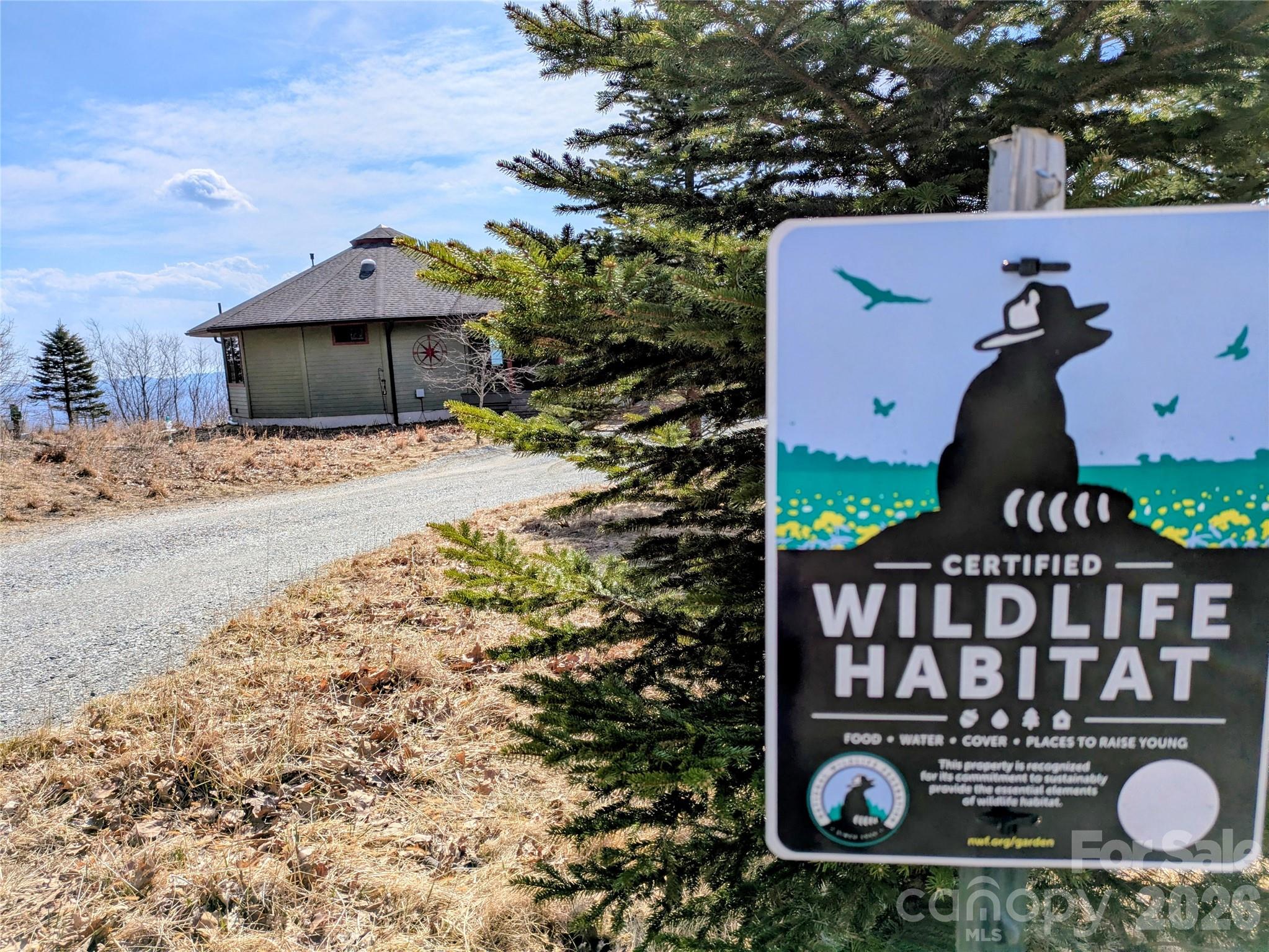 448 Howards Knob Road Boone, NC 28607 - Photo 13 of 38 a front view of a house with garden