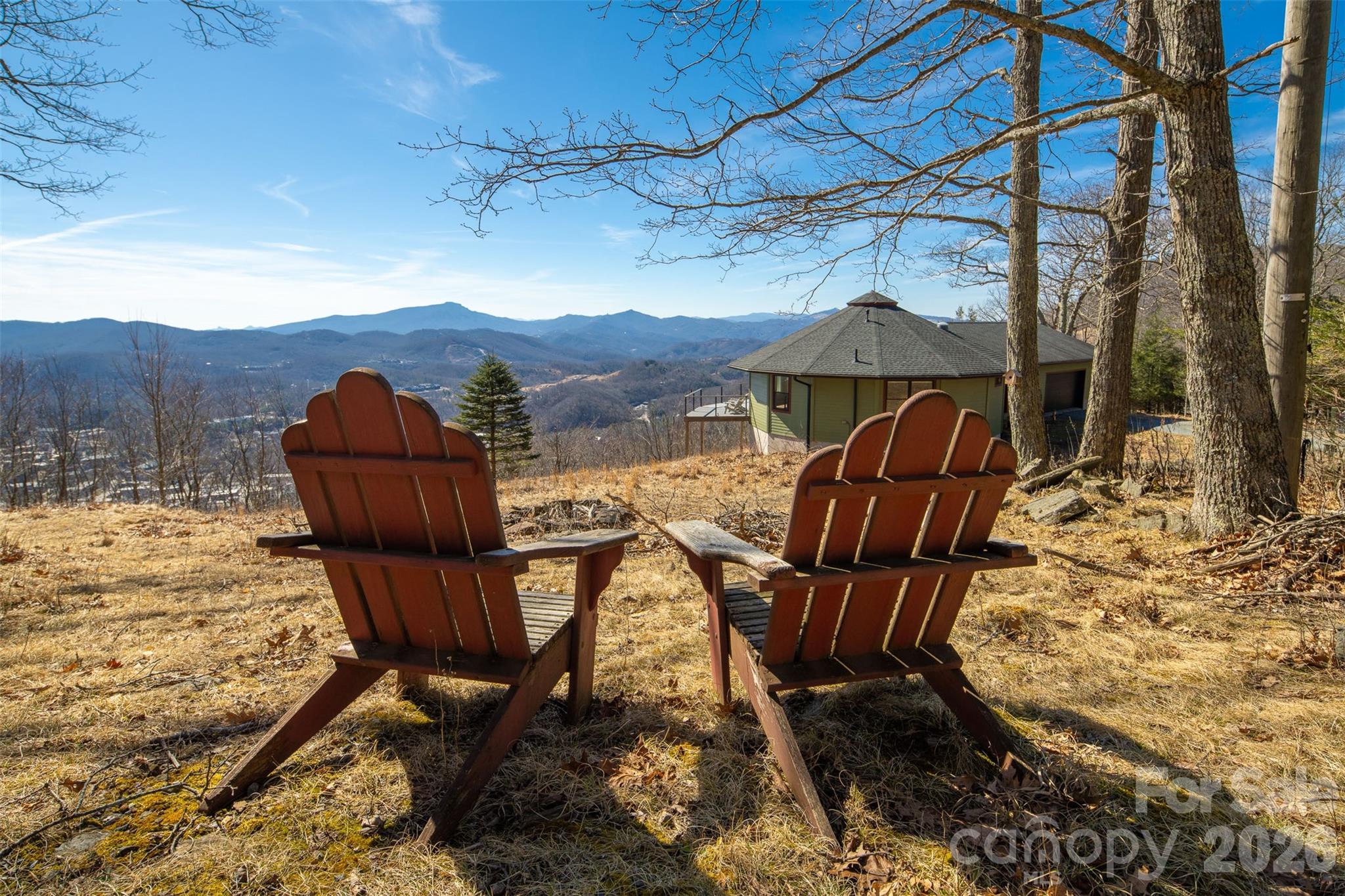 448 Howards Knob Road Boone, NC 28607 - Photo 2 of 38 a view of balcony with table and chairs