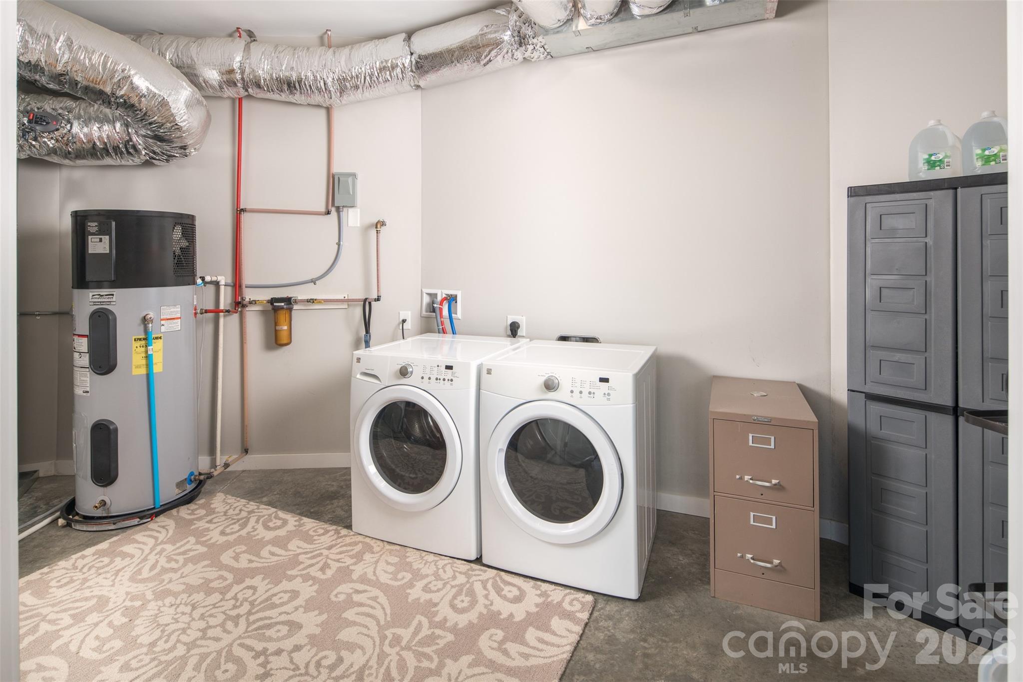 448 Howards Knob Road Boone, NC 28607 - Photo 23 of 38 a utility room with dryer and washer