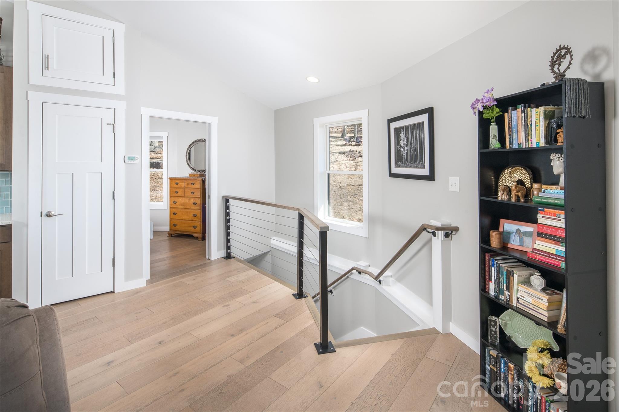 448 Howards Knob Road Boone, NC 28607 - Photo 25 of 38 a view of a hallway with window and closet