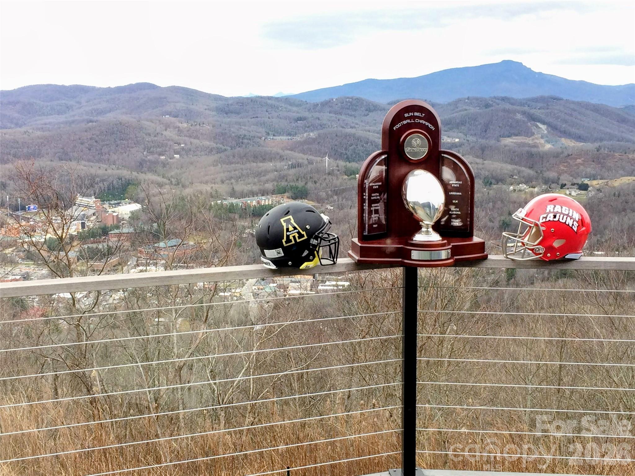 448 Howards Knob Road Boone, NC 28607 - Photo 9 of 38 a bathroom with a sink and a mirror