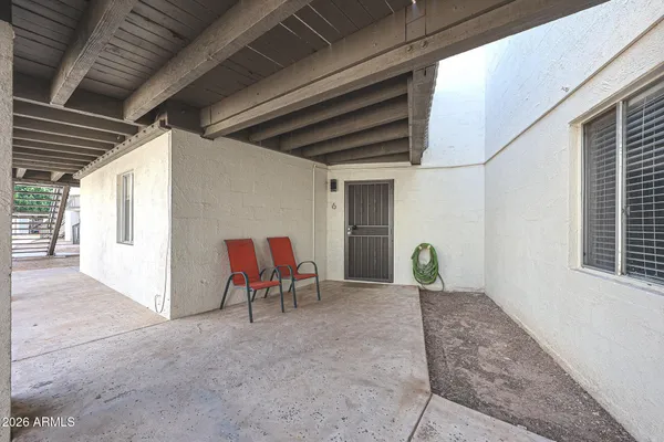 a view of chairs in the balcony
