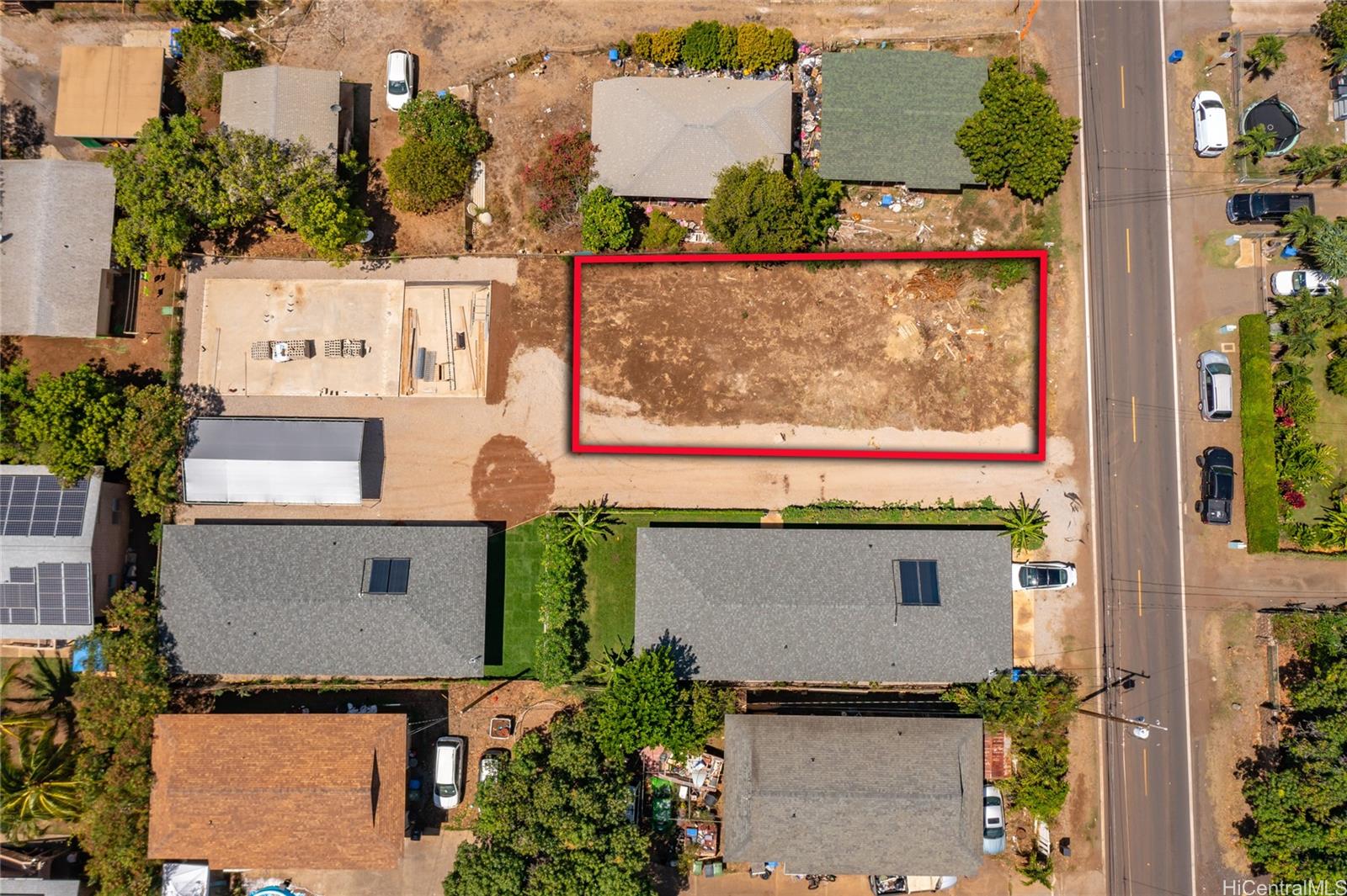 84-993 Lahaina Street, Unit 2 Waianae, HI 96792 - Photo 4 of 4 aerial view of a house with a yard and sitting area