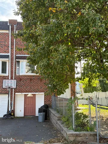 a front view of a house with a garage