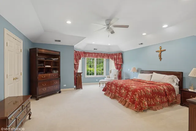 a bed room with a bed and a tv