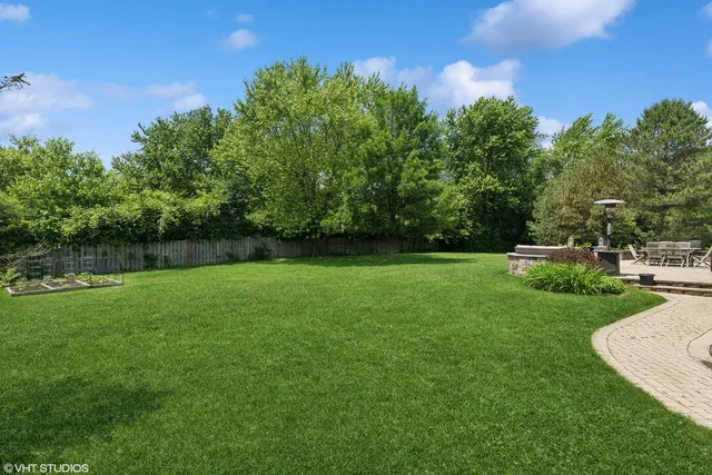 a view of a garden and basketball court