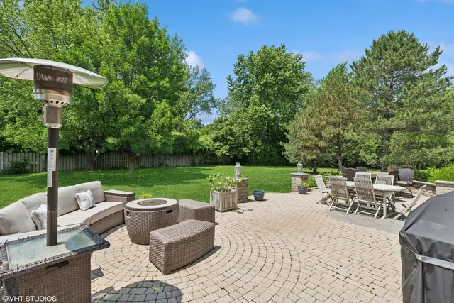 a view of a patio with a yard