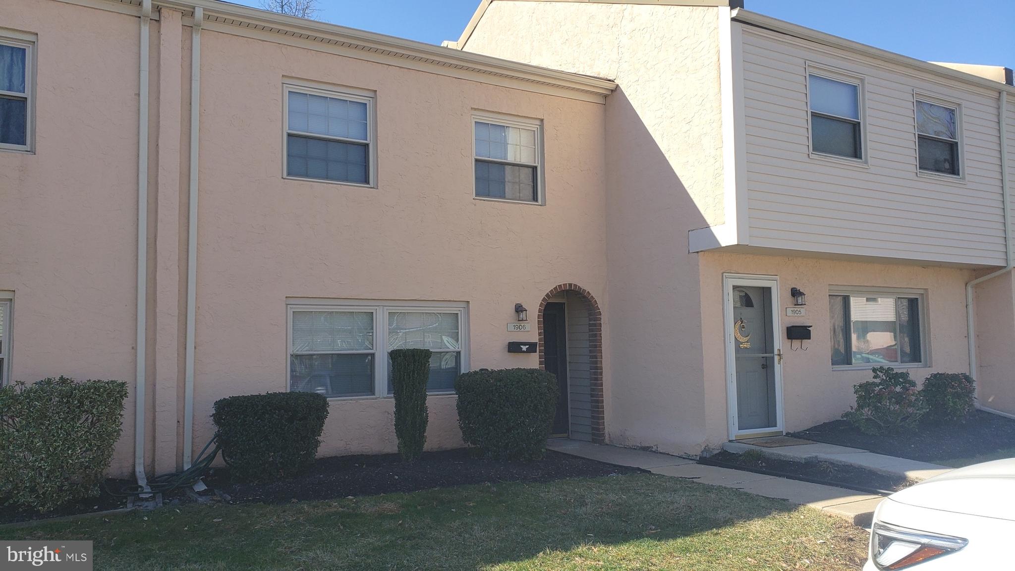 a view of living room and patio