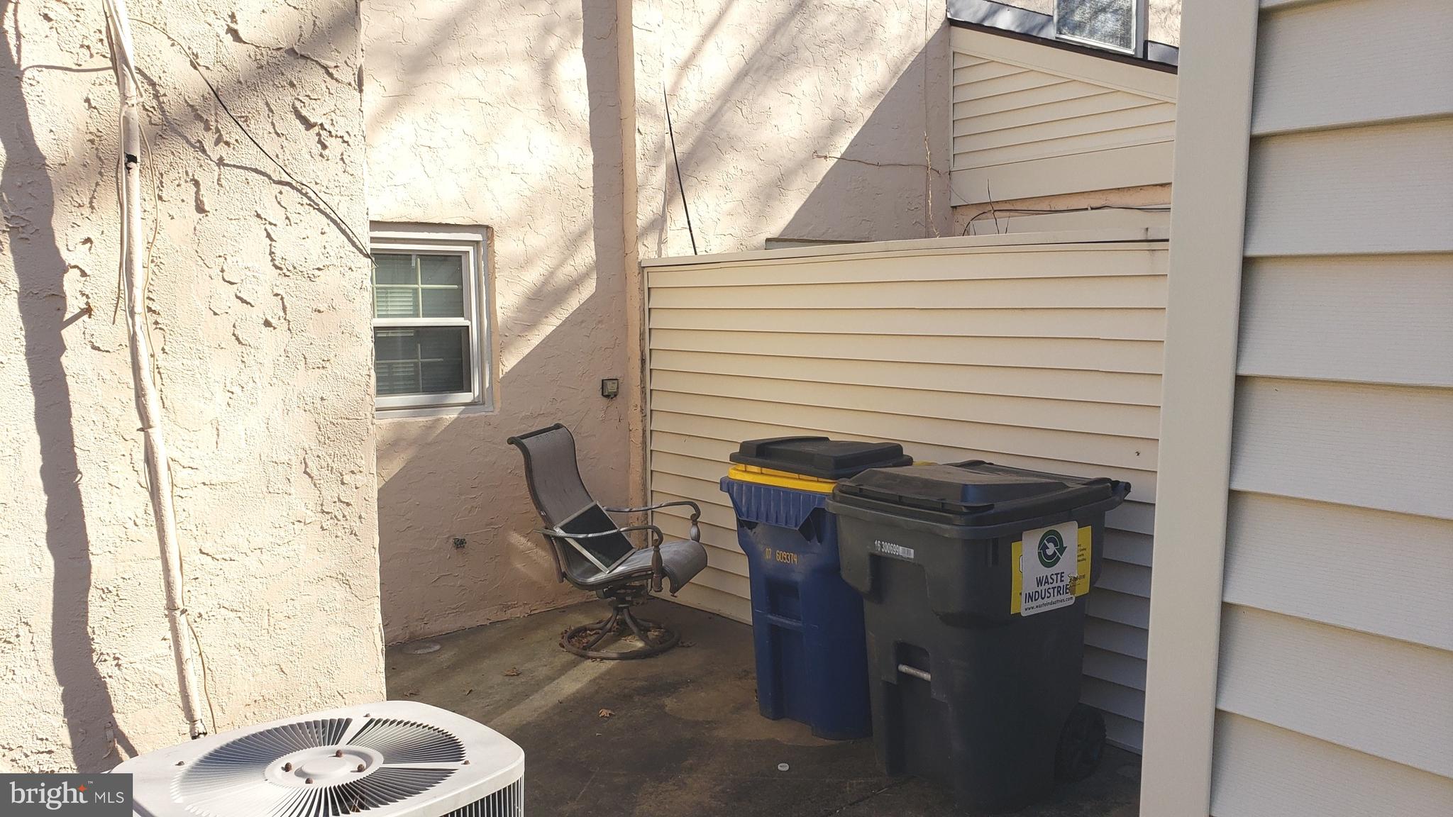 1906 Chelmsford Circle Newark, DE 19713 - Photo 13 of 14 a view of a door and chair in back of the house