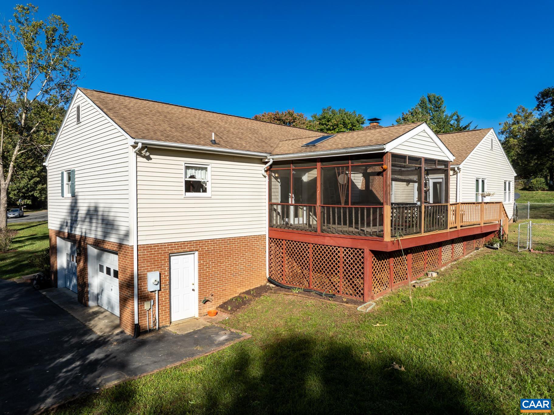 208 Rolling Hills Road Ruckersville, VA 22968 - Photo 3 of 56 a view of a house with wooden fence