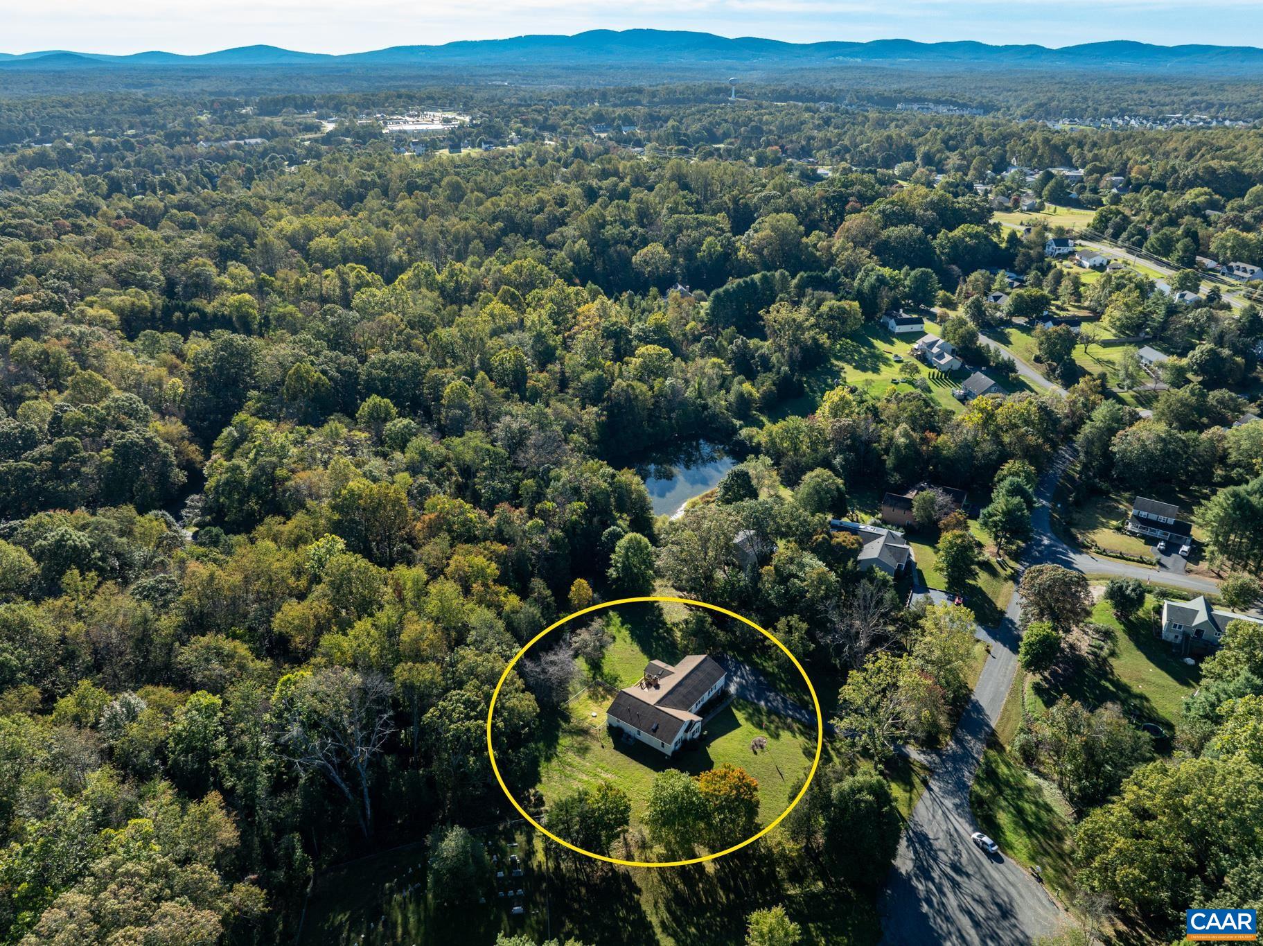 208 Rolling Hills Road Ruckersville, VA 22968 - Photo 46 of 56 an aerial view of a house with a yard
