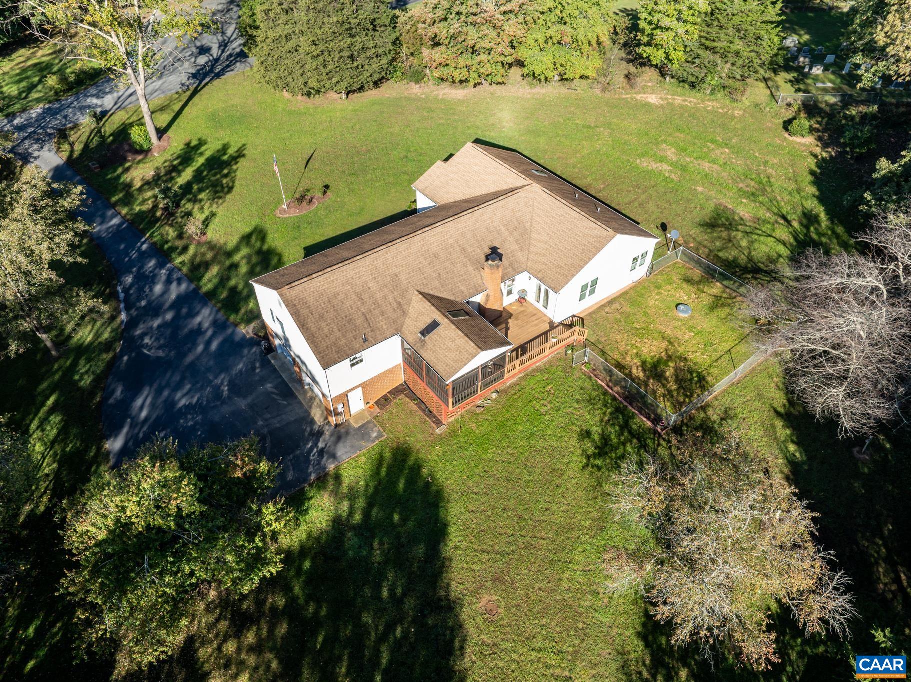 208 Rolling Hills Road Ruckersville, VA 22968 - Photo 8 of 56 an aerial view of a house with a yard