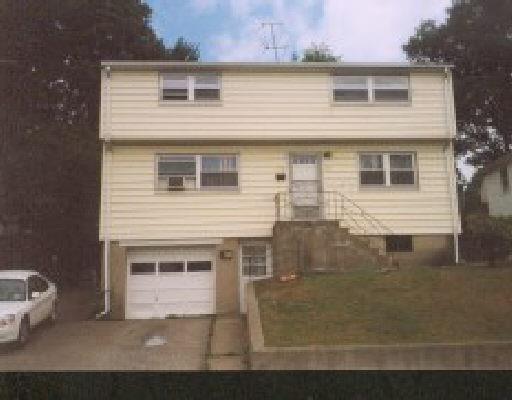 514 Merritt Street Bridgeport, CT 06606 - Photo 1 of 1 a front view of a house