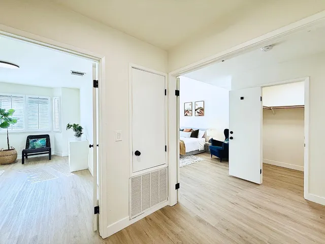 a view of a living room and hardwood floor