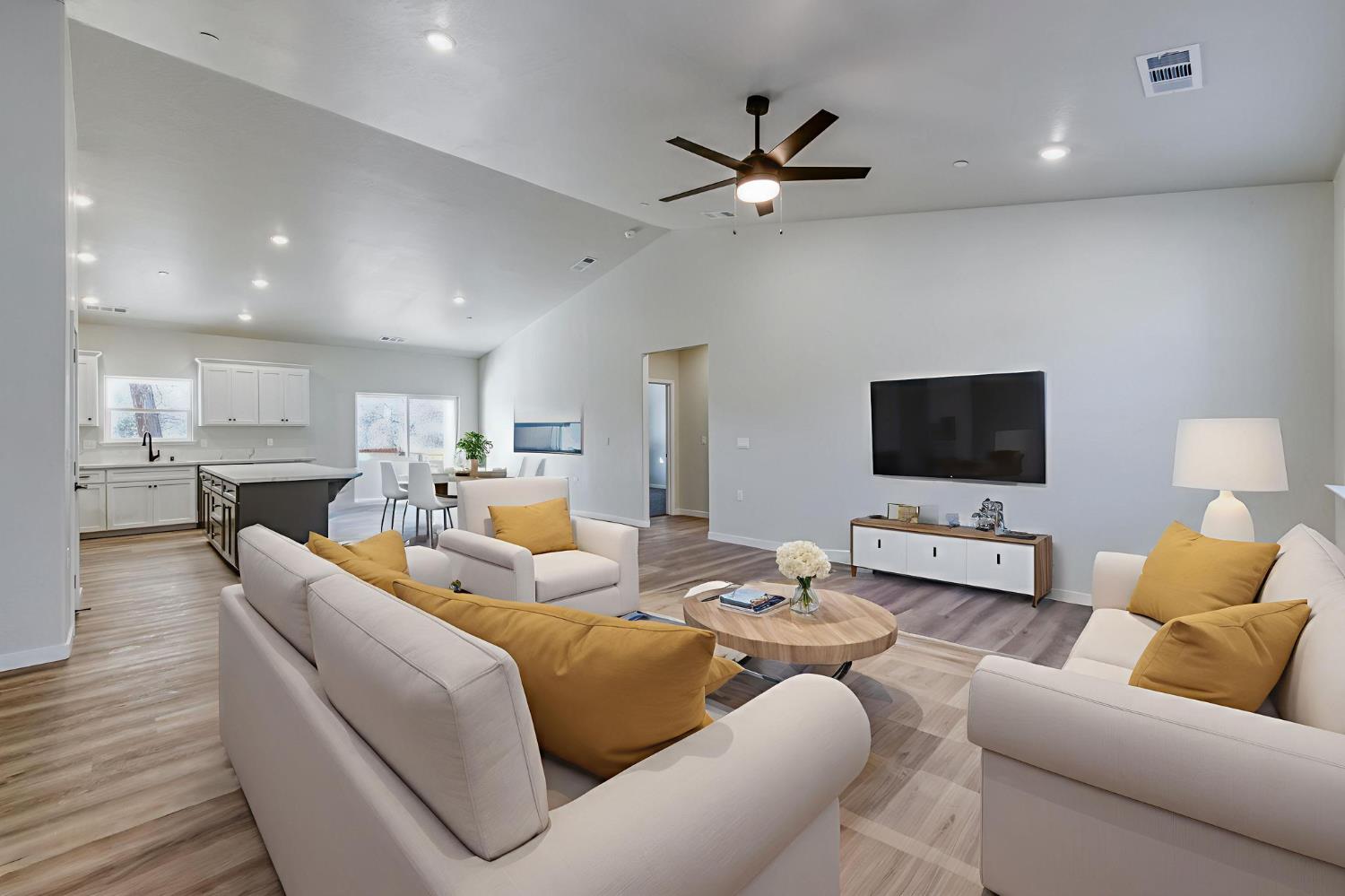 41940 Colt Court Coarsegold, CA 93614 - Photo 7 of 50 a living room with furniture and a flat screen tv