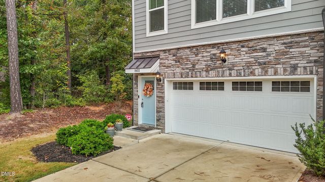 a view of a big house with many windows