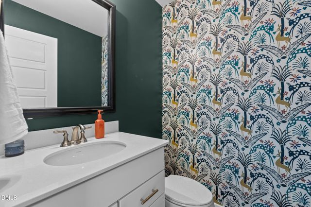 a view of an chairs with wooden fence