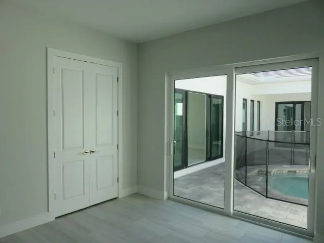 a view of elevator with sliding glass door