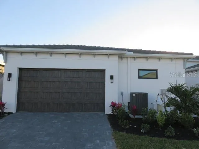 a view of a street with a building in the background