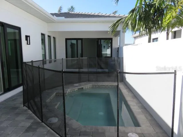 a hallway with a view of living room