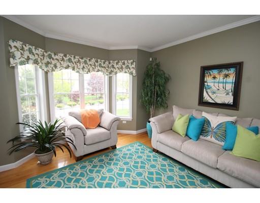6 Wagon Wheel Road North Attleboro, MA 02760 - Photo 15 of 30 a living room with furniture and a large window