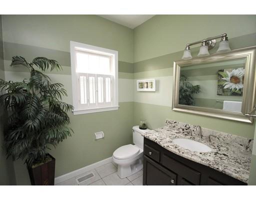 6 Wagon Wheel Road North Attleboro, MA 02760 - Photo 17 of 30 a bathroom with a granite countertop sink toilet and a mirror