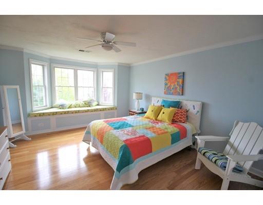 6 Wagon Wheel Road North Attleboro, MA 02760 - Photo 23 of 30 a bedroom with a bed and a large window