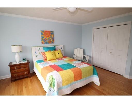 6 Wagon Wheel Road North Attleboro, MA 02760 - Photo 24 of 30 a bedroom with a bed and a lamp on dresser